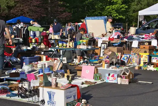 Tables of household items at an on-site liquidation event